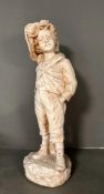 A plaster figure of a Victorian boy with his hands in his pockets (H63cm)