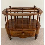 A Burr walnut Canterbury with slender spindles, dividers, drawer on turned legs (H 57cm x 60cm x