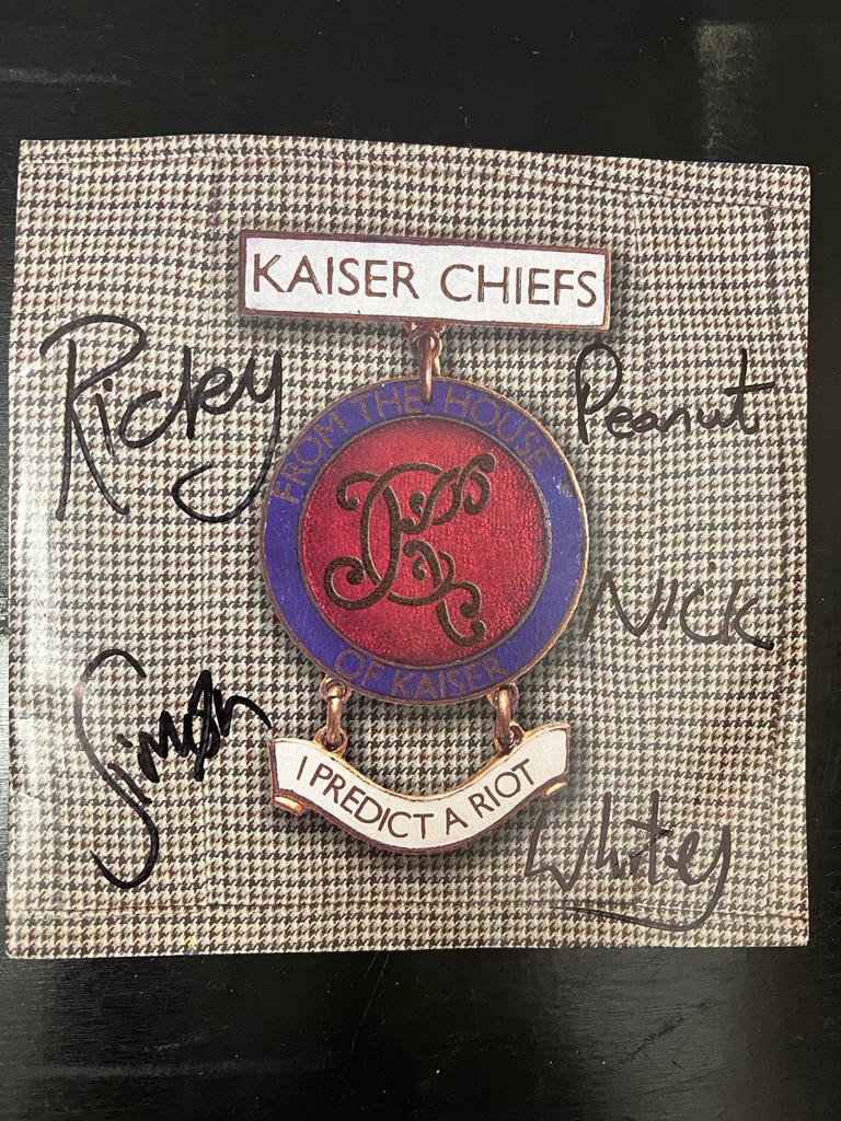 A signed Kaiser Chiefs I Predict a Riot