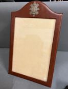 A brown leather picture frame bearing the badge of The Black Watch (47cm x 29.5cm)