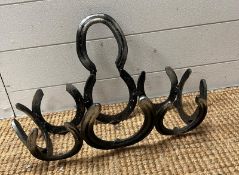 A horse shoe tray (missing its base) 45cm x 18cm