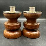 A Pair of turned wood and silver candlesticks by Horace Woodward & Co Ltd, hallmarked for London