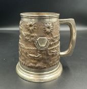A Sterling silver tankard with Indian design (Approximate Total weight 358g and height 12.5cm)