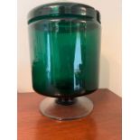 A large Mid Century green glass lidded pot on a footed base (H30cm Dia20cm)