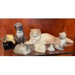 A selection of cat figures by Nao, Lladro and other makers