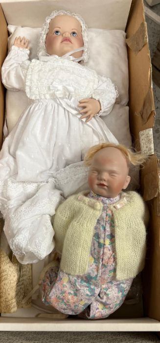 Two vintage dolls with china faces, legs and hands
