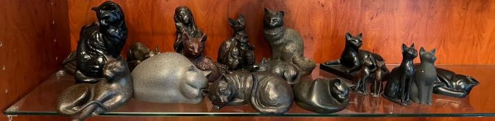 A large selection of bronze effect and stone cat statues by various makers most signed Jana,