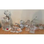 A selection of crystal glass cats by Waterford Villroy and Bosh