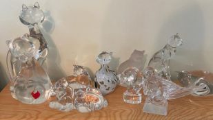 A selection of crystal glass cats by Waterford Villroy and Bosh