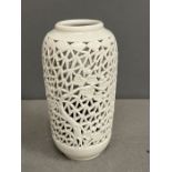 A white pierced vase/jar