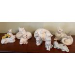 A selection of porcelain cats various makers including Royal Doulton, Crown and Royal Worcester