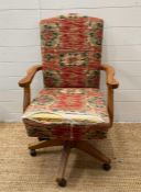 A light oak desk chair on castors AF