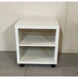 A small Ikea side table on castors (H58cm W52cm D40cm)