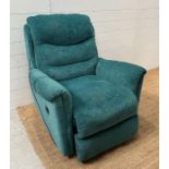 A green upholstered electric reclining armchair by Prestige