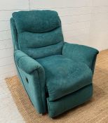 A green upholstered electric reclining armchair by Prestige