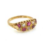 A vintage ring with a full hallmark of a ruby and diamond checkerboard.18 carat gold