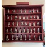 The Kings and Queens England metal figures in a wall display case