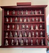 The Kings and Queens England metal figures in a wall display case