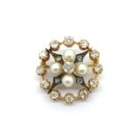 Antique circular brooch set with old cut diamonds and natural pearls. Tested as high carat gold with