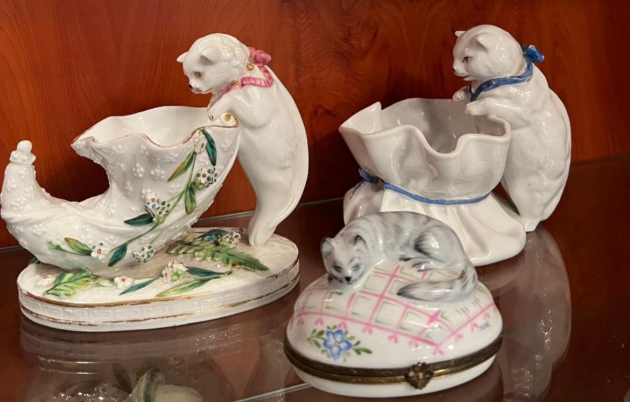 Three porcelain china statues