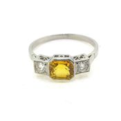 Platinum Yellow sapphire and diamond 3 stone ring Yellow sapphire 1.40 carats Diamond total 0.25