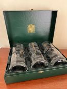 A cased set of whisky glass etched with the house of commons logo