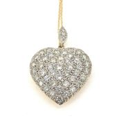 A diamond set heart on a chain marked 750