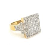 A unique unisex ring set with 64 invisible set princess cut diamonds inside a mille-grain edge.