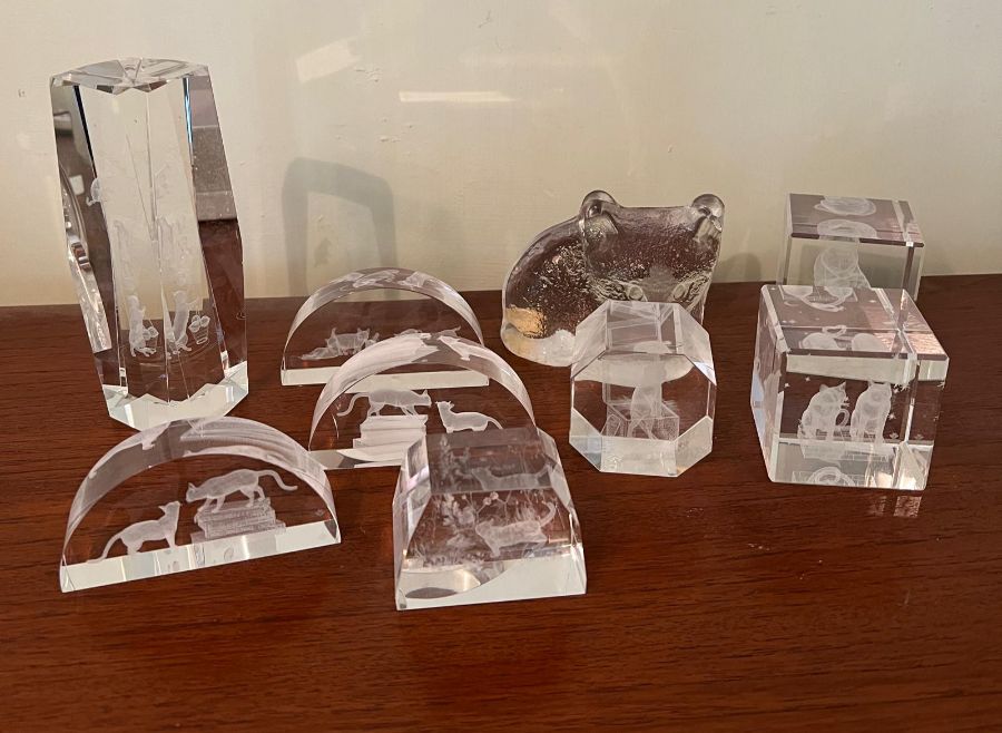 Nine paperweights etched with cats, one by Mats Jonasson Sweden glass and one lead crystal