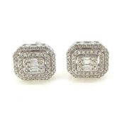 Illusion set double halo earrings. Total weight 1 carat. 18 carat white gold.