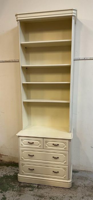 A white painted dresser with four shelves and two over two drawers under by Olympus (H224cm W77cm