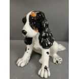 A China figure of a spaniel dog