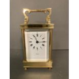 A brass carriage clock by Agetus
