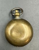 A Brass sovereign holder