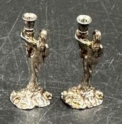 A Pair of hallmarked miniature silver candlesticks, probably dolls house furniture, hallmarked to