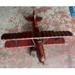 A wooden red aircraft model (AF wheel)