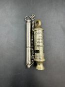 The Metropolitan Bucks Special Constabulary whistle along with an ACME dog whistle on chain