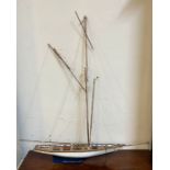 A wooden model of a yacht (H96cm W78cm)