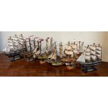 Six model sailing ships
