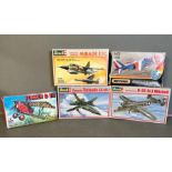 A selection of five vintage aeroplane model kits. Revell, Matchbox and ESCI.