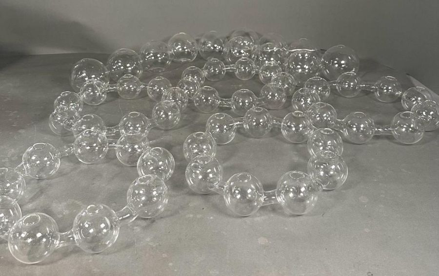 A selection of glass Serax vases. Five nine ball and three four ball