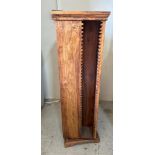 A large hardwood revolving CD rack