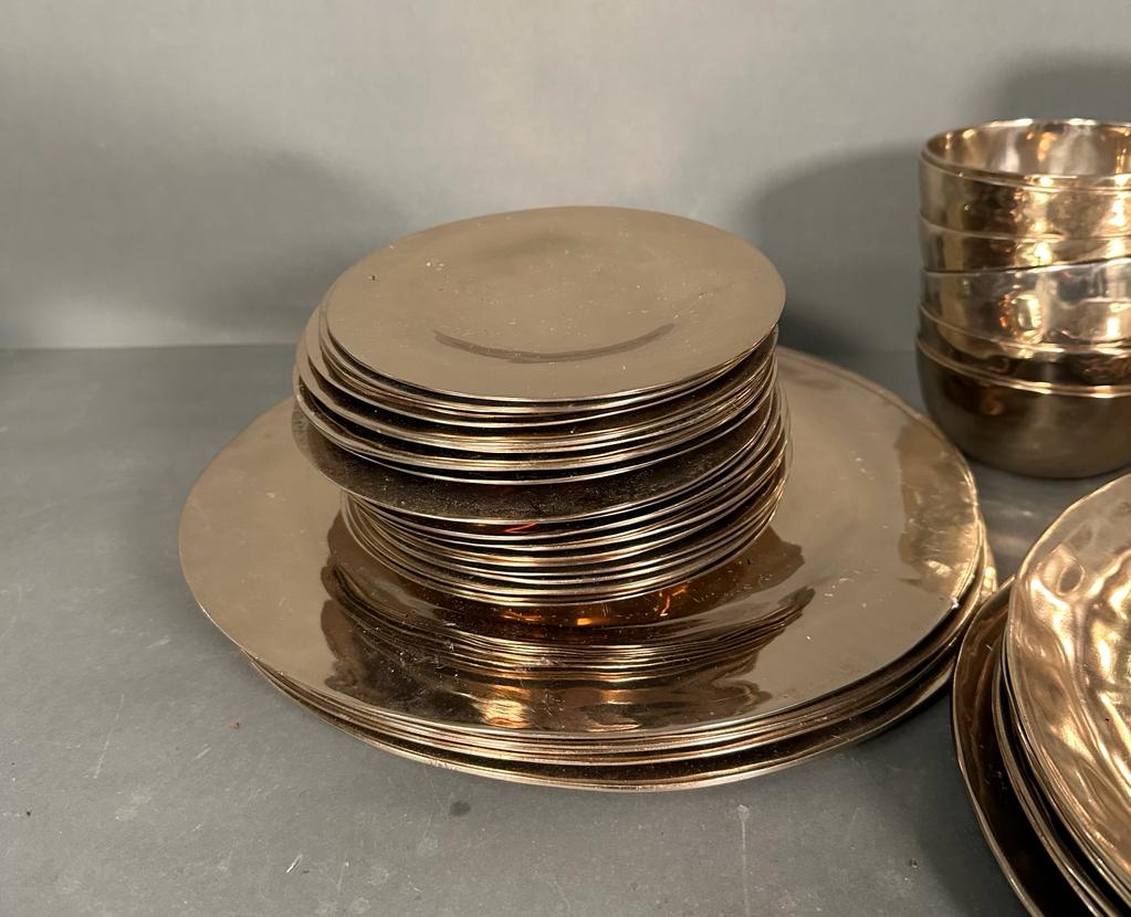 A hammered metal dinner service comprising of four serving plates, fourteen dinner plates, twenty - Image 5 of 6