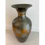 A vase with a checker pattern to centre