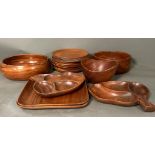 A selection of wooden plates, bowls, dishes and platters