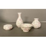 A small selection of Wedgewood china vases, pin dish and bowl