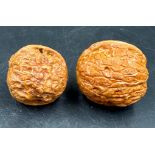 Two Chinese carved walnuts