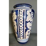 A large blue and white vase with floral pattern