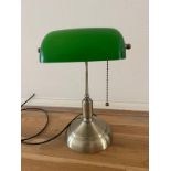 A green glass shaded contemporary bankers lamp.