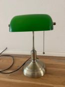 A green glass shaded contemporary bankers lamp.